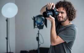 Fotograf bei der Arbeit Fotograf bei der Arbeit