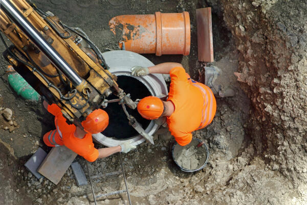 Kanalbauer auf Baustelle Kanalbauer auf Baustelle