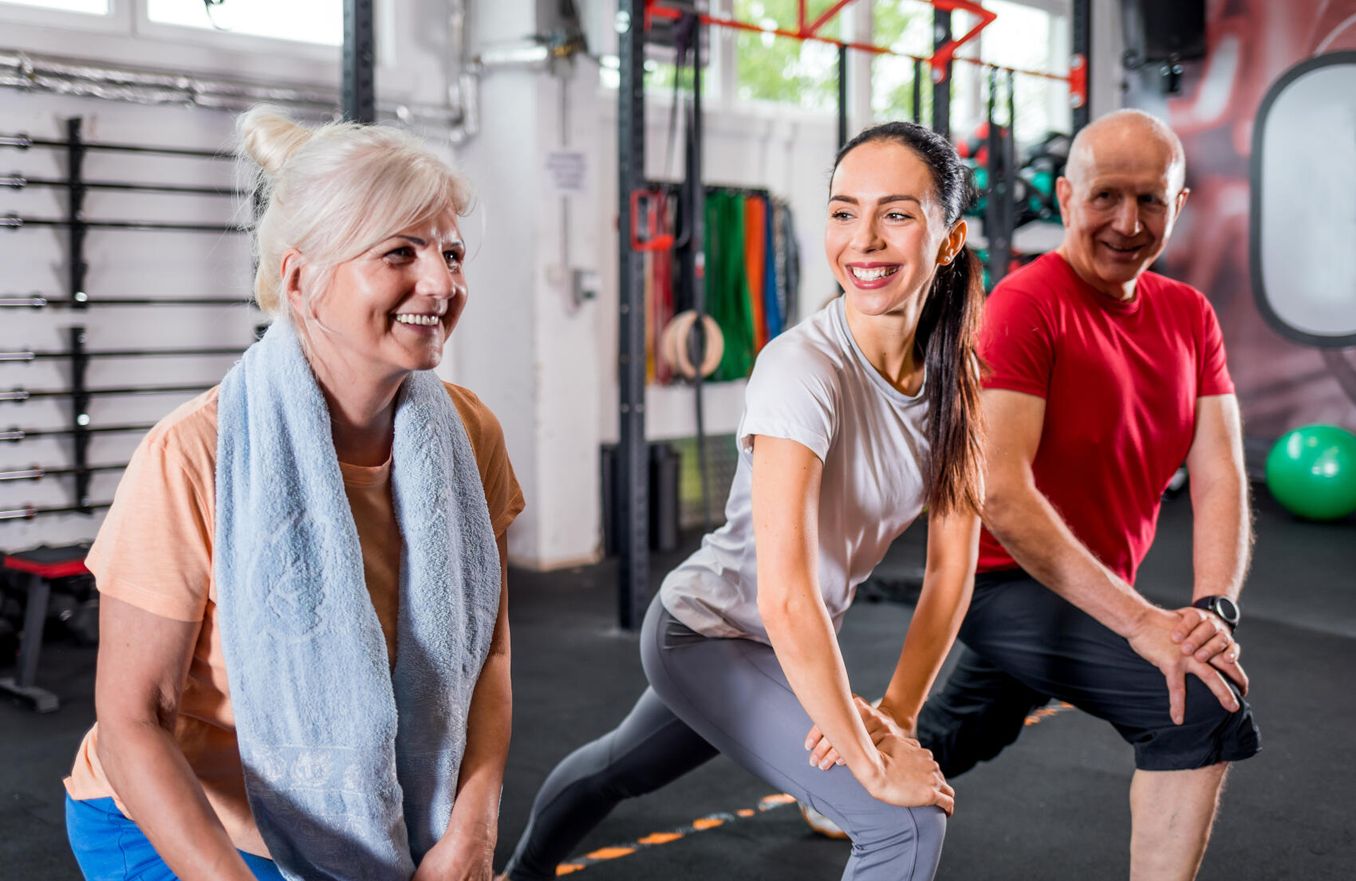 Berufe mit Sport – Trainerin mit Mann und Frau