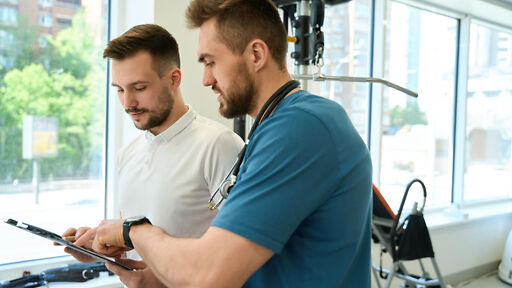 Sportwissenschaftler bei der Arbeit Sportwissenschaftler bei der Arbeit